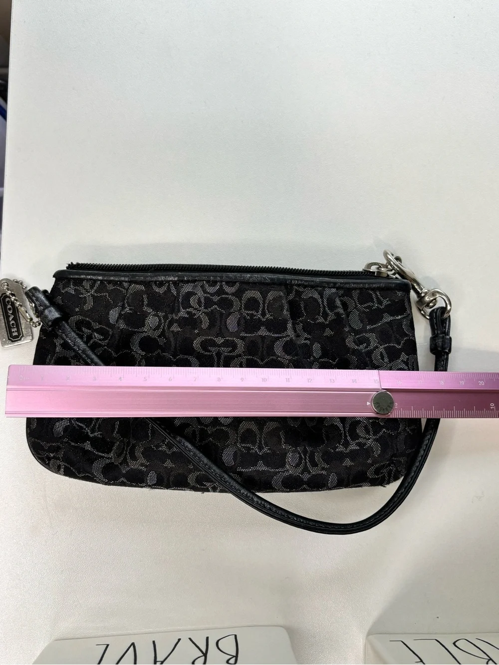 Coach, Black and silver lurex wristlet pre owned loved . Vintage